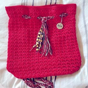 The Sak Red Crochet tote backpack